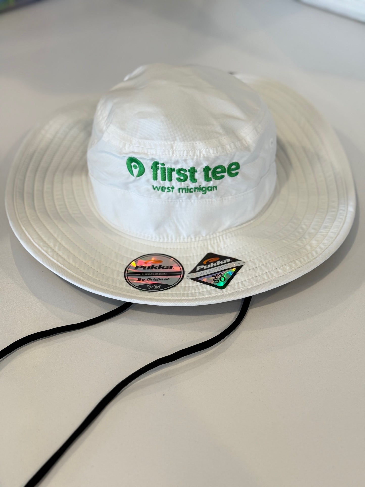 Pukka Bucket Hat White with Green Logo